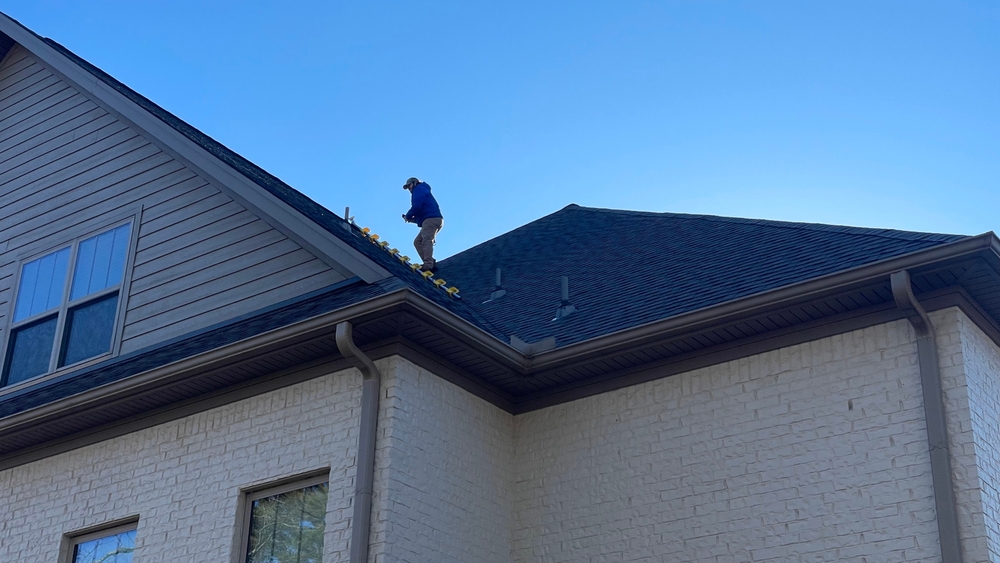 contractor inspecting a roof
